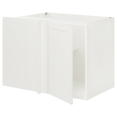 A white ENHET corner kitchen cabinet with a single door and a shelf. Its rectangular, made of particleboard and plastic, designed for storage.