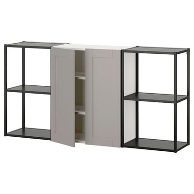 The ikea ENHET storage unit in grey. It open shelving and closed cabinets with a sleek, modern design, combining both metal and wood materials.