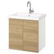 ENHET light wood vanity unit; modern rectangular design. Includes white sink, chrome tap, and wooden cabinet.