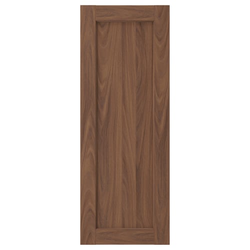 A brown walnut cabinet door with a smooth finish and subtle wood grain texture. The door has a rectangular frame and panel design.