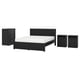 Black bedroom furniture set with modern design; includes bed, two nightstands, and dresser. Dark wood finish and brass handles.