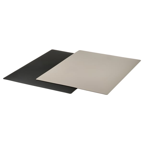 FINFÖRDELA: set of 2 bendable cutting mats, black & beige, rectangular, non-slip underside, flexible.