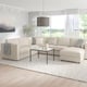 Modern cream-colored FINNALA sectional sofa in bright living room with large windows, white rug, and minimalist decor.