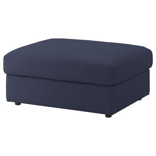 FINNALA blue upholstered ottoman, rectangular, fabric-covered with circular pattern.