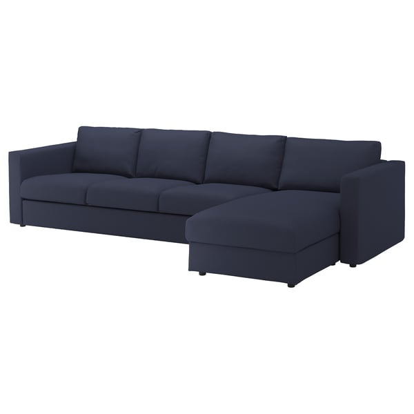FINNALA sofa: dark blue, modern, l-shaped, clean lines, plush cushions.