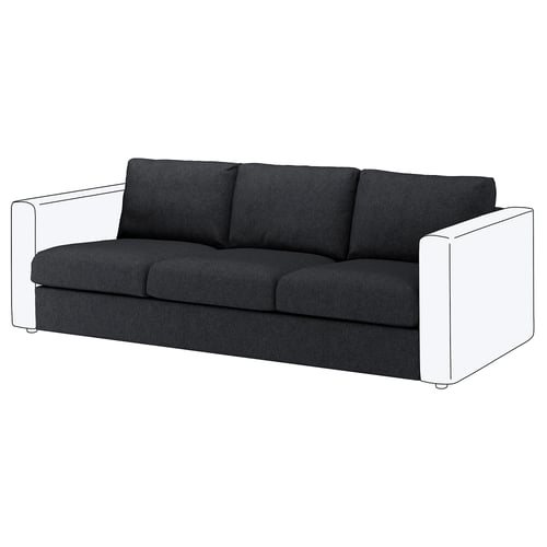 Black FINNALA sofa with white accents. Modern, minimalistic design, plush cushions.