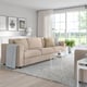 Modern living room with FINNALA sectional sofa, armchairs, coffee table, and decor.