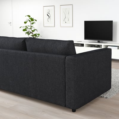 Modern living room with FINNALA dark grey sectional, minimalist design.