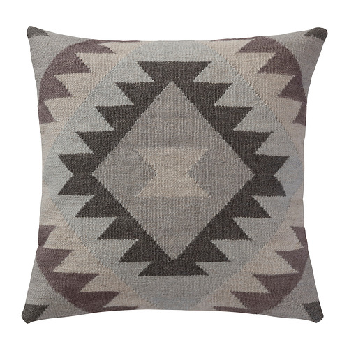 This cushion cover is jacquard-woven, which adds an extra depth to the grey-black geometric pattern. Just as decorative on the sofa as on the bed. Maybe with a matching throw? and how to choose couch pillows?