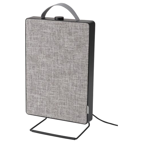 A grey fabric-covered air purifier with carry handle, standing on a base.