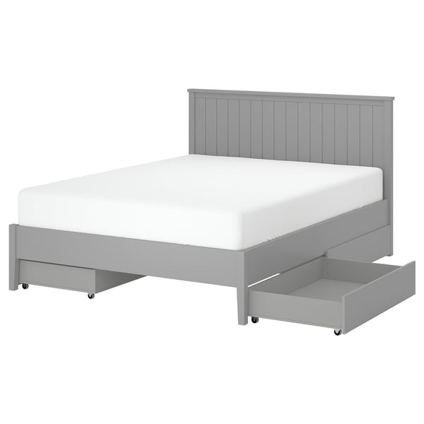Grey GULLABERG bed with panel headboard, white mattress, and under-bed storage drawers.