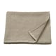 Folded light grey waffle weave towel, made of 100% cotton.