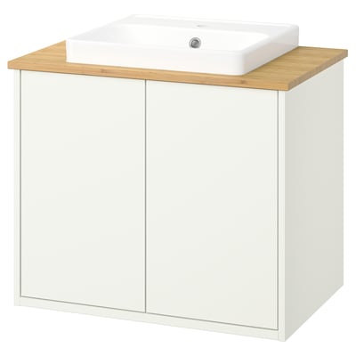 Havbaeck white bathroom cabinet with bamboo countertop and rectangular sink.