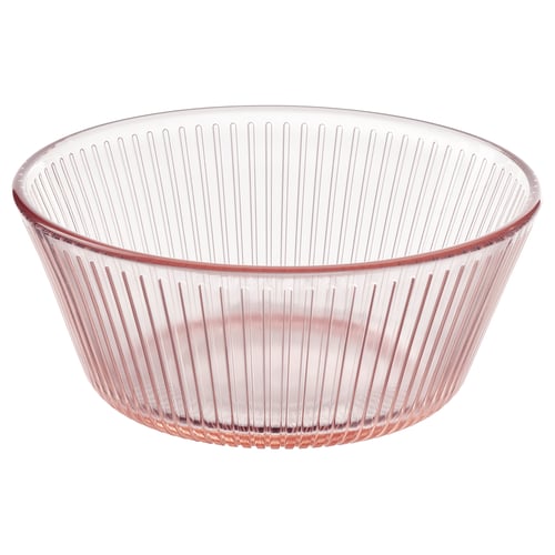 A light pink, ribbed glass bowl with a round shape and smooth edges. Its part of the HAVSGÄDDA series.