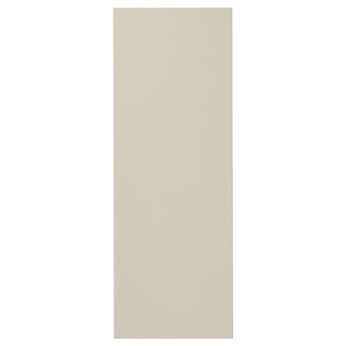 Beige HAVSTORP cabinet door, rectangular, smooth finish.
