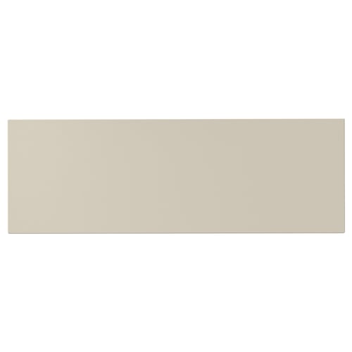 A beige rectangular HAVSTORP panel, smooth and modern, often used in kitchen designs.