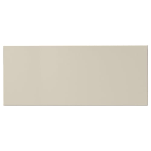 Beige HAVSTORP cabinet front, smooth and rectangular, modern design.