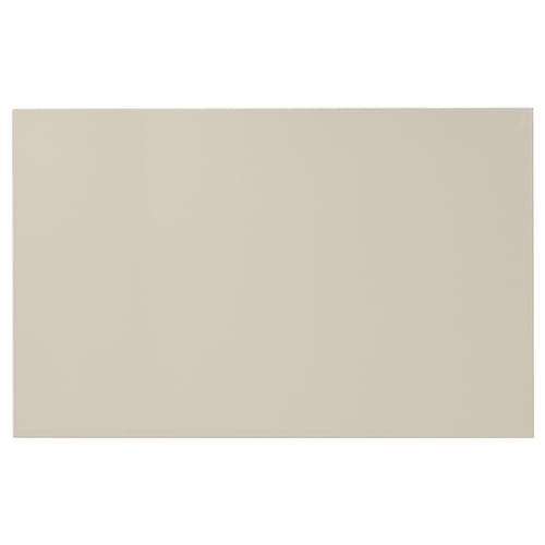 Beige HAVSTORP kitchen cabinet, rectangular with smooth lacquered finish.