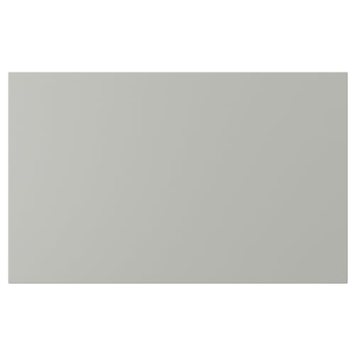 A flat, light grey HAVSTORP kitchen cabinet door in a sleek, modern design.
