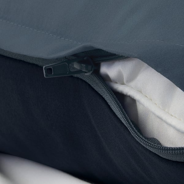 Zip on pillow sham secures pillow, showcasing grey and white colour combo.