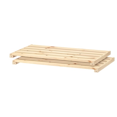 A HEJNE wooden shelf, natural in colour, made of solid pine, with a rectangular shape and simple design.