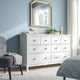 HEMNES chest with 6 drawers, gold mirror, chair, plant, bed.