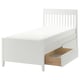 A white IDANÄS bed frame with built-in drawers and a wooden headboard. Its simple and functional, with a sturdy design.