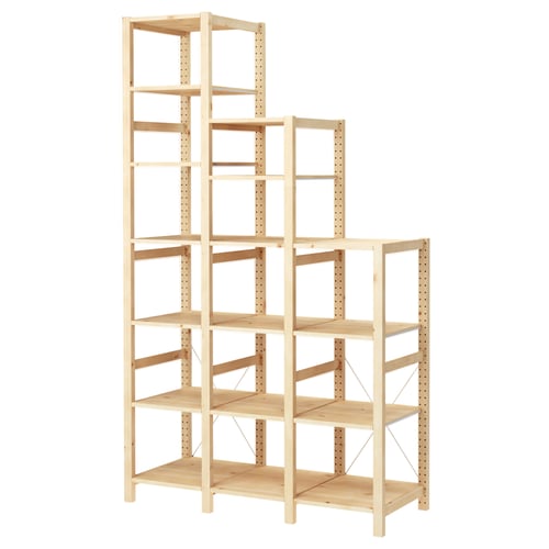 IVAR light wood shelf unit with multiple adjustable shelves.