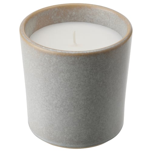 JÄMNMOD candle in grey ceramic jar with rustic glaze, plant-based wax.