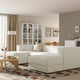 Modern living room with JÄTTEBO sofa, two chaise lounges, bookcase, coffee table, and rug.