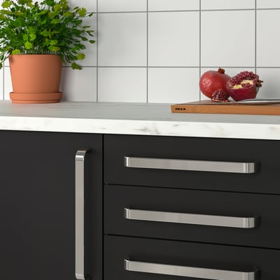 KALERUM silver handles: sleek, durable, nickel-plated, ideal for cabinets.