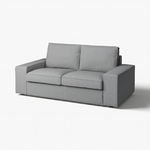 The KIVIK sofa is grey, modern, with low armrests, and plush cushions for comfort. Its upholstered in recycled polyester.