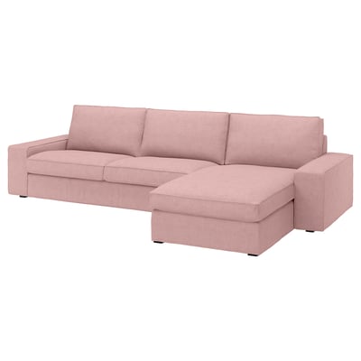 A light pink KIVIK sectional sofa with a chaise lounge, showcasing a modern and comfortable design with removable, machine-washable covers.