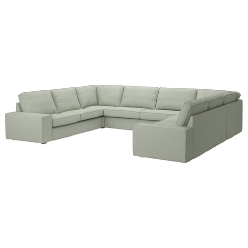 A KIVIK sectional sofa in a light green colour, featuring deep cushions, armrests, and a modular design with a 10-year warranty.