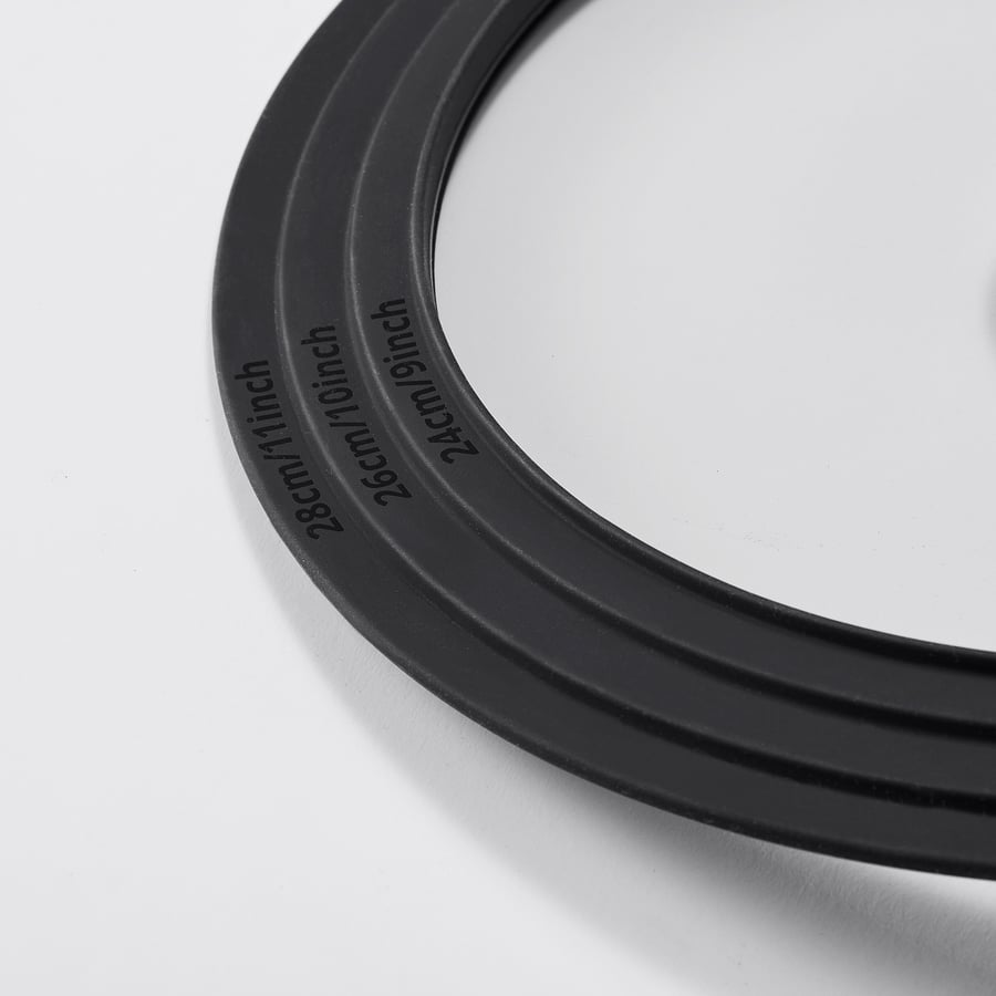 Black silicone belt with measurements imprinted, folded neatly.
