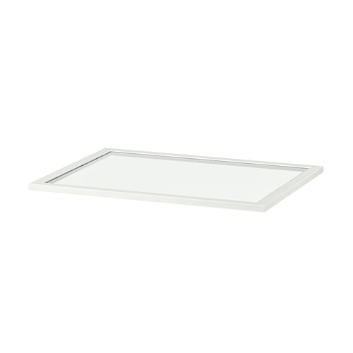 An ikea KOMPLEMENT glass shelf, transparent, rectangular, with a white border.