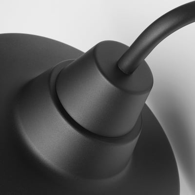 Modern outdoor wall lamp with sleek black finish and protected design.