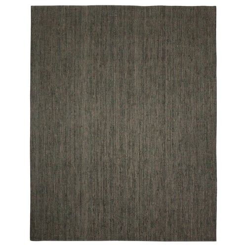 A dark green LANDBANA jute rug with a natural, flat-woven texture.