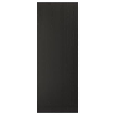 A black LERHYTTAN kitchen cabinet door with a traditional style and bevelled edges made from ash veneer.