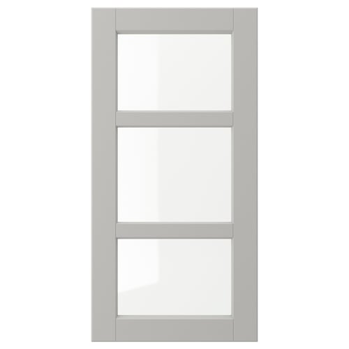 A light grey LERHYTTAN kitchen cabinet door with a solid wood frame, bevelled edges, and a glass panel.