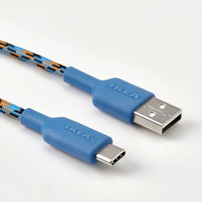 Two blue usb cables with colourful braided design, one with usb-a and the other with usb-c connectors, branded IKEA.