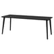 Minimalist black rectangular dining table with sleek metal legs, modern design.