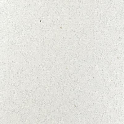 Smooth, speckled white worktop with slight blemishes, showcasing recycled glass texture.