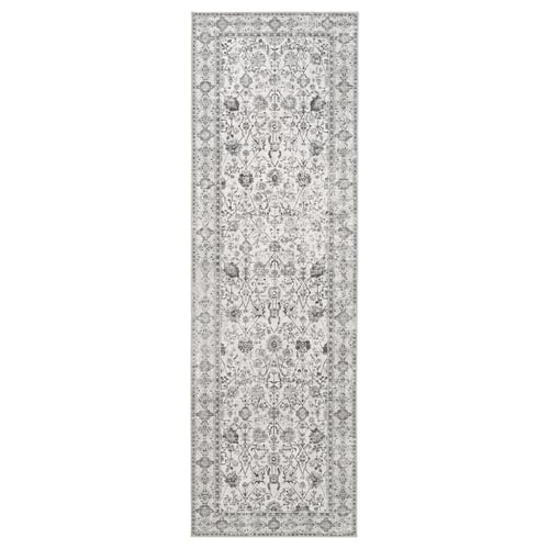 Long, grey, rectangular runner rug with intricate floral patterns in black and white, made from recycled polyester.