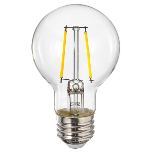 Clear globe-shaped lamp with yellow filaments.