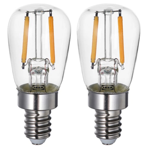 Two ikea LUNNOM led bulb, clear glass, warm white light, retro style.