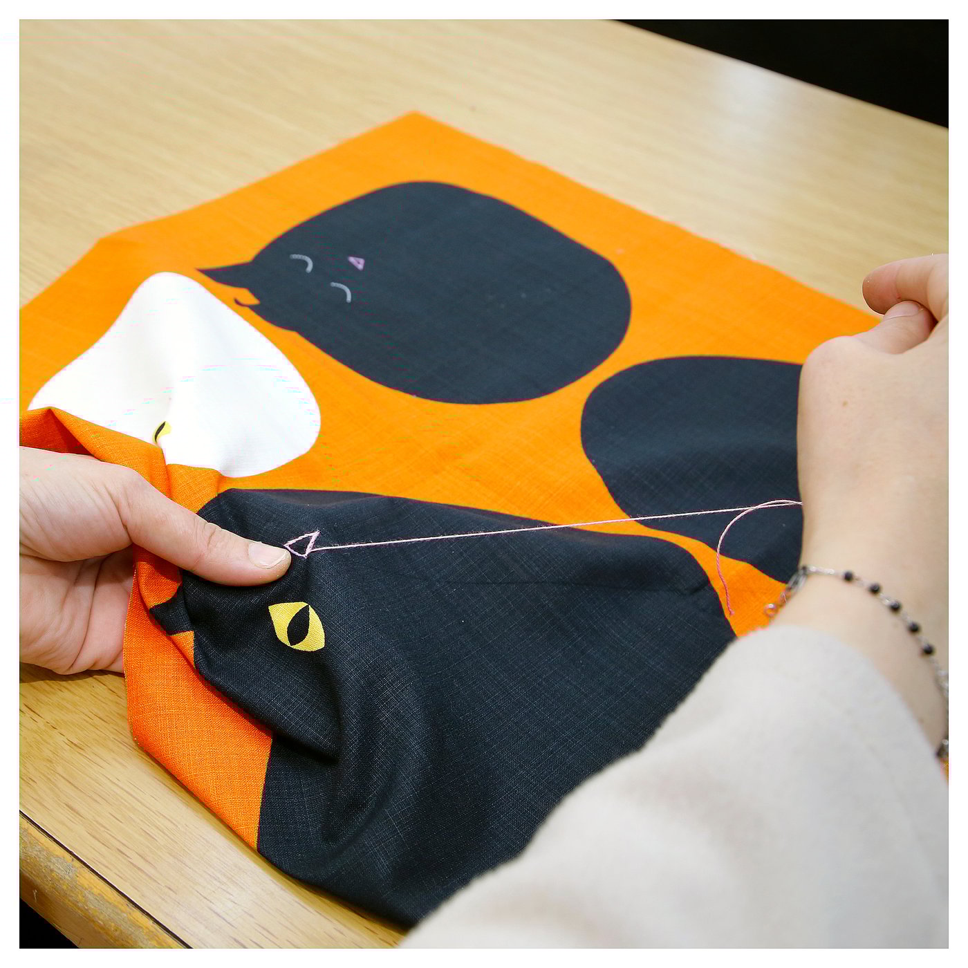 MÄVINN cushion cover, cat pattern orange, 20x20