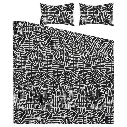 The MAJSMOTT bedding set in black and white with a leaf pattern, featuring a comforter and two pillow shams.