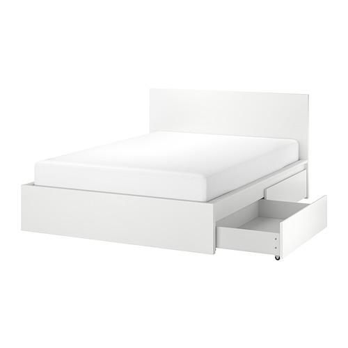 White MALM bed with open drawer, minimalist design.