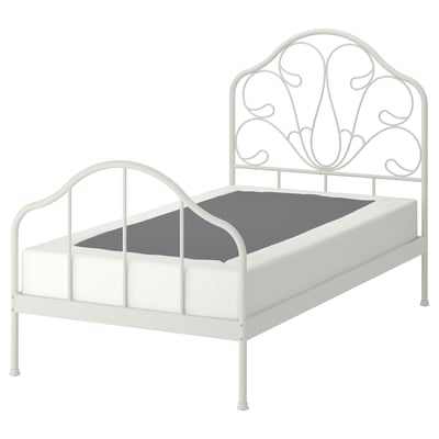 MELLGRUND: white, ornate metal bed frame with curved design and grey mattress.